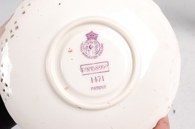 Lot 1020 - A Royal Worcester porcelain Empress teacup and...