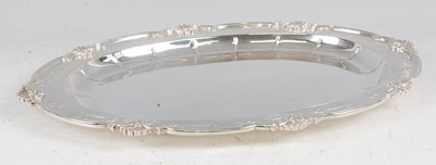 Lot 1098 - A George V silver meat dish, of oval form, the...