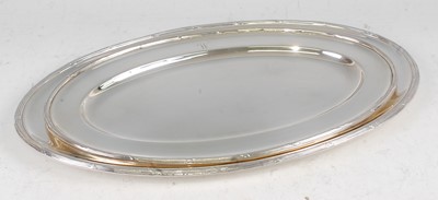 Lot 1103 - A graduated pair of Mappin & Webb silver meat...