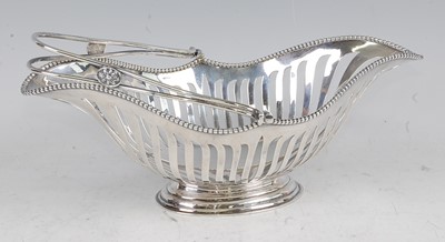 Lot 1109 - An Edwardian silver basket, of pierced...