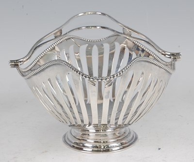 Lot 1109 - An Edwardian silver basket, of pierced...