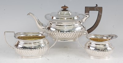 Lot 1117 - A George V silver three-piece tea-set,...