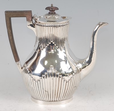 Lot 1118 - An Edwardian silver coffee pot, of pear shape...