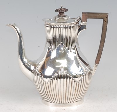 Lot 1118 - An Edwardian silver coffee pot, of pear shape...