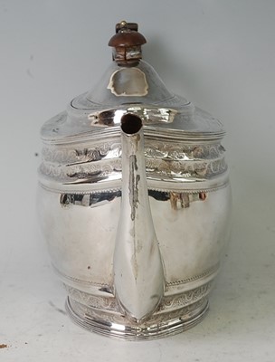 Lot 1122 - A George III silver teapot, having a finial...