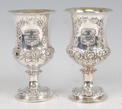 Lot 1124 - A pair of mid-Victorian silver pedestal...