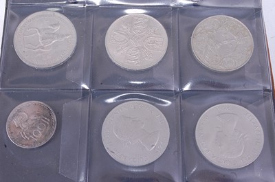 Lot 2147 - A folder containing forty four various coins...