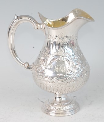 Lot 1130 - A late Victorian silver pedestal cream jug, of...