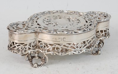 Lot 1131 - A George V silver trinket box, of circular...