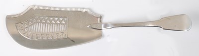 Lot 1135 - A late Georgian silver fish slice, of typical...