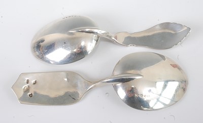 Lot 1139 - A near-pair of mid-Victorian silver serving...