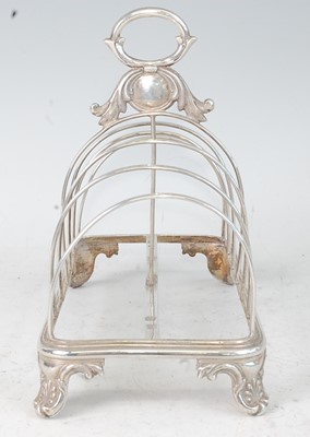 Lot 1129 - A William IV silver six-division toast rack,...