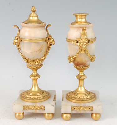 Lot 1267 - A pair of late 19th century alabaster and gilt...