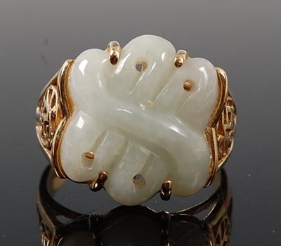 Lot 2563 - A 14ct yellow gold jadeite dress ring,...