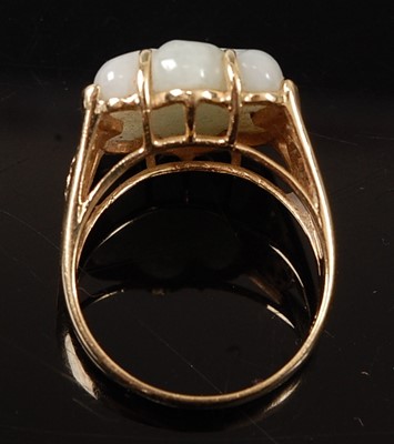 Lot 2563 - A 14ct yellow gold jadeite dress ring,...