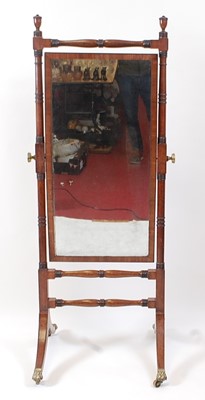 Lot 1393 - A Regency mahogany cheval mirror, the...
