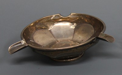 Lot 121 - A late Art Deco silver circular ashtray,...