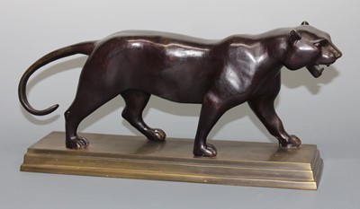 Lot 187 - An Art Deco style patinated bronze model of a...