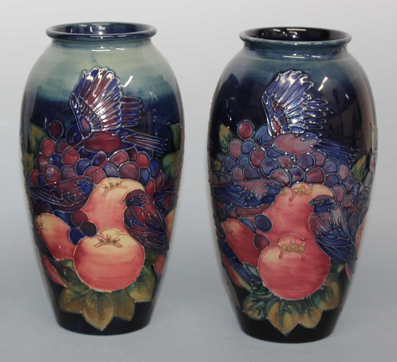 Lot 13 - A pair of modern Moorcroft pottery vases in...