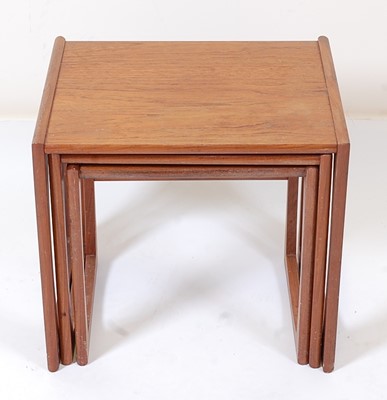 Lot 373 - A 1970s G-Plan nest of three occasional tables,...