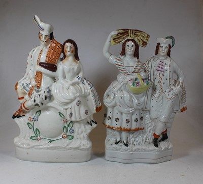 Lot 8 - A pair of Victorian Staffordshire flatback...