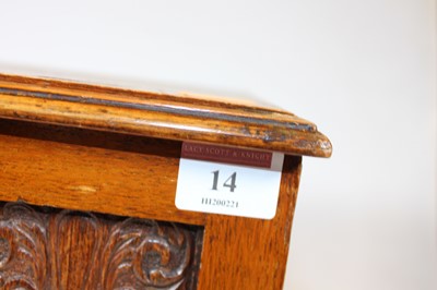 Lot 14 - An Edwardian oak smokers cabinet, having a...