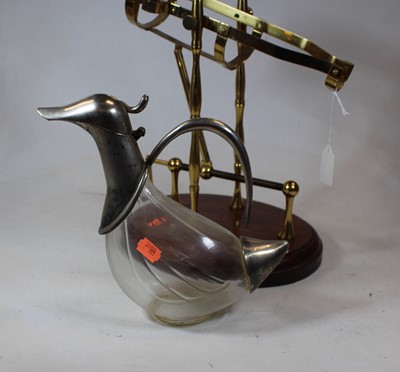 Lot 21 - A brass framed decanting cradle with rotating...
