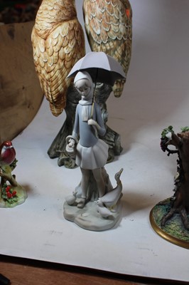 Lot 30 - A Lladro Spanish porcelain figure of a girl,...