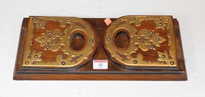 Lot 42 - A Victorian walnut and brass mounted sliding...