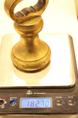 Lot 43 - A set of three early 20th century brass bell...