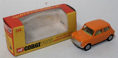 Lot 1221 - Corgi Toys 204 Morris Mini Minor, in orange...