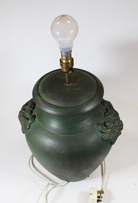 Lot 81 - A modern green glazed table lamp of squat...