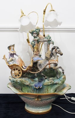 Lot 110 - A large Lladro(?) porcelain model of a lady in...