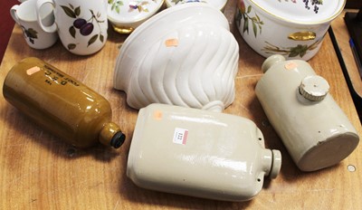 Lot 122 - A collection of three stoneware foot-warmers;...