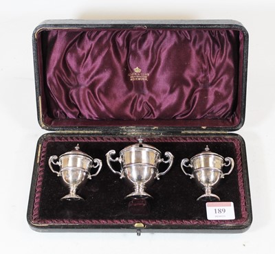 Lot 189 - A late Victorian silver three piece cruet each...