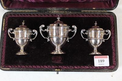 Lot 189 - A late Victorian silver three piece cruet each...
