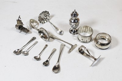 Lot 246 - A small collection of assorted silver and...