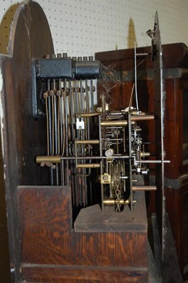 Lot 1106 - A 1930s oak grandmother clock retailed by...