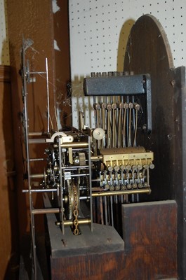 Lot 1106 - A 1930s oak grandmother clock retailed by...