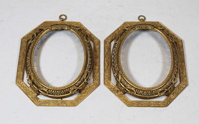 Lot 320 - A pair of late 19th century gilt metal frames,...