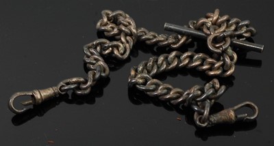 Lot 269 - A silver curblink watch chain with T bar, 63g,...
