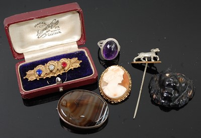 Lot 273 - Assorted costume jewellery, to include carved...