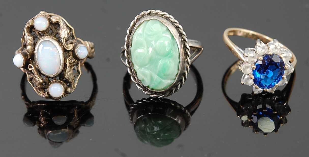 Lot 291 - A 9ct gold, blue and white stone set cluster...