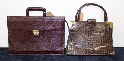 Lot 380 - A lady's crocodile skin and brass mounted...