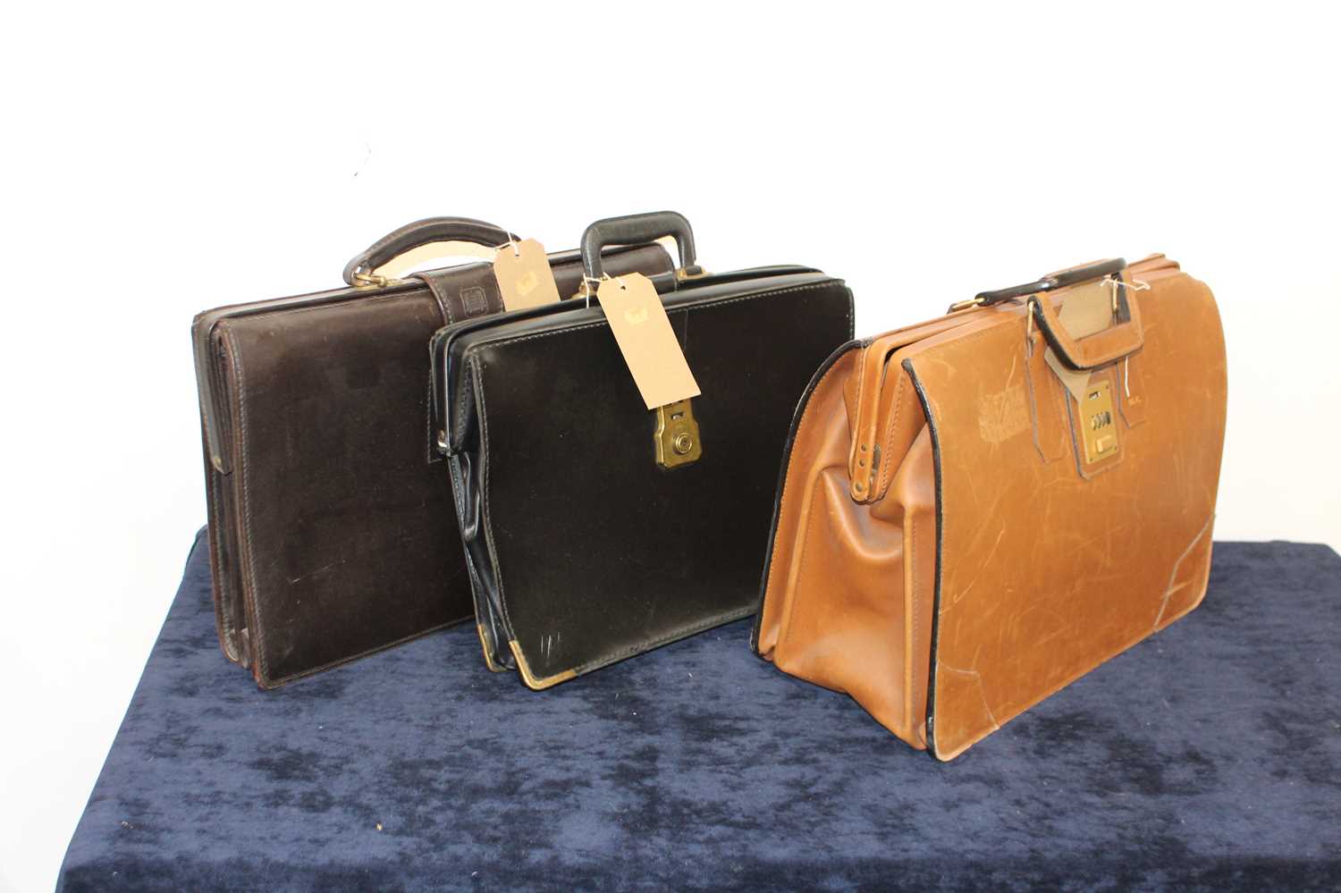 Lot 383 - A gent's tan leather satchel with combination...