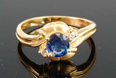 Lot 1217 - An 18ct yellow gold, sapphire and diamond...