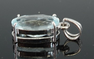 Lot 1225 - A white metal aquamarine single stone pendant,...