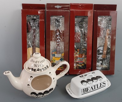 Lot 561 - A set of four Music Legends Beatles miniature...