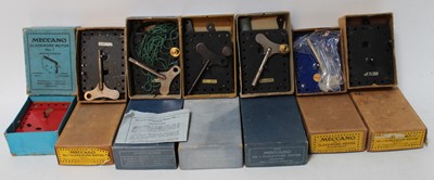 Lot 828 - Seven Meccano clockwork motors, all boxed,...