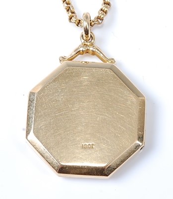 Lot 2570 - A yellow metal octagonal locket with a centre...